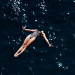 Tragic Discovery: Swimmer Missing After Possible Shark Attack Identified