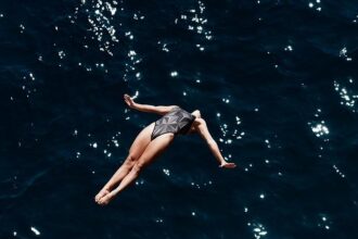 Tragic Discovery: Swimmer Missing After Possible Shark Attack Identified