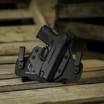 Startling Police Encounter: Sleeping Driver Found with Hidden Handgun in Running Car!